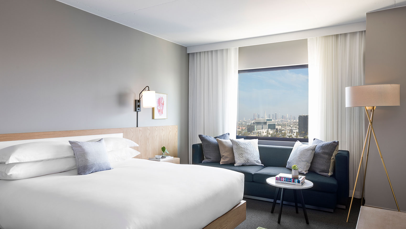 Kimpton Everly Hotel Suite bed and sitting area within bedroom