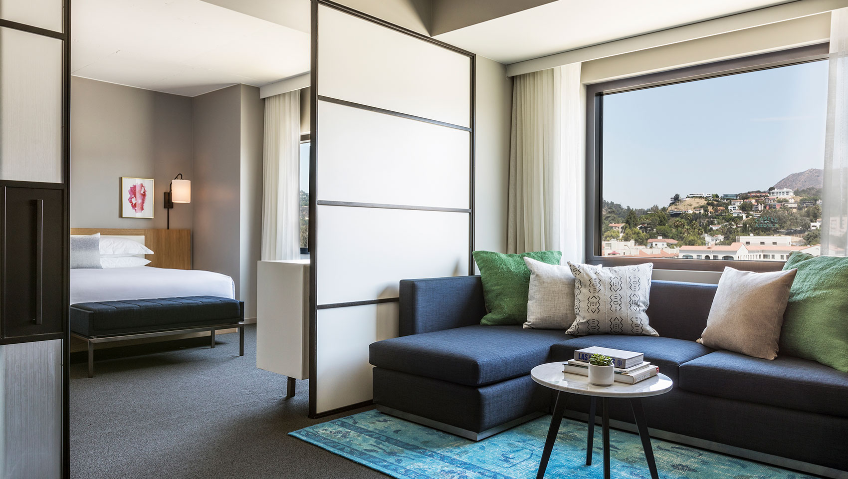 Kimpton Everly Hotel One Bedroom Suite Sitting area with view of bedroom