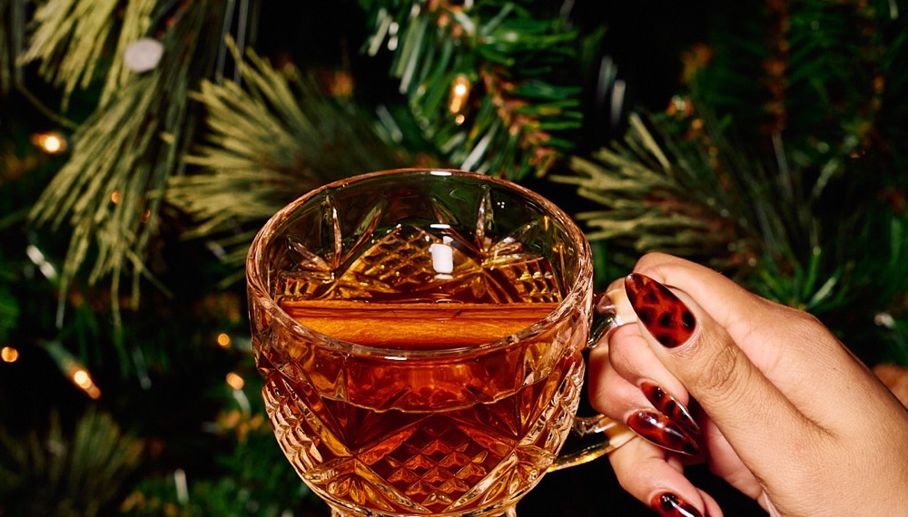 hand holding a holiday cocktail