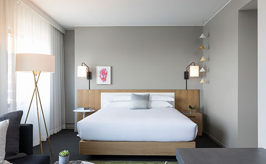 Suite king bed at Kimpton Everly Hotel